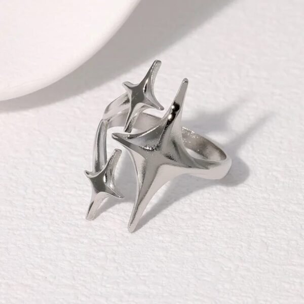 a6b95e16-ba81-4b26-84ac-1616ef35902f ANILLO ESTRELLAS PLATEADO