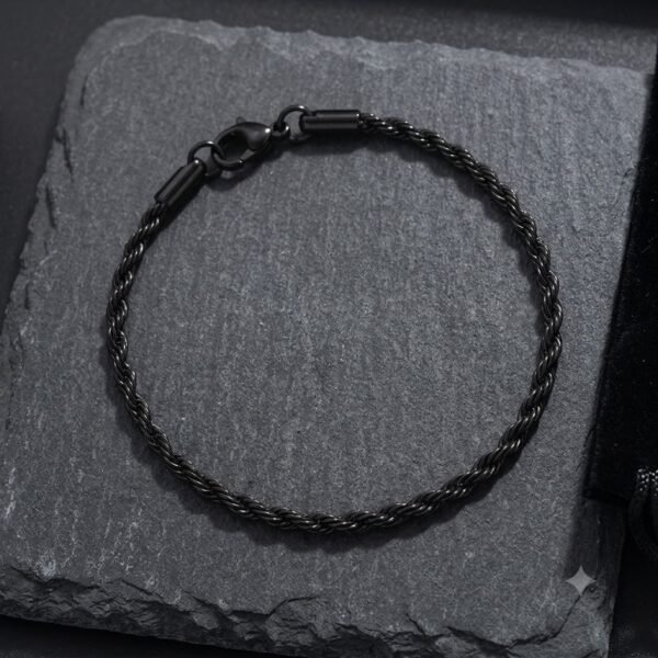 cf71319d-ee84-4afa-9fa2-8fb5931821df PULSERA TRENZADA NEGRA