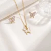 SET ARETES Y COLLAR MARIPOSA